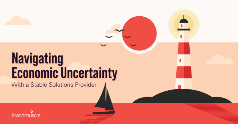 Navigating economic uncertainty with a stable solutions provider text with a sailboat in the water going toward a bright lighthouse