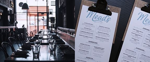 Dark restaurant tables with menus