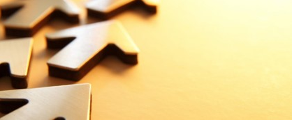 Gold arrows pointing upward