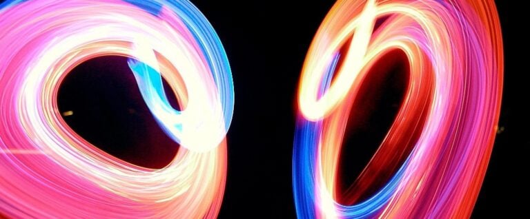 colorful light loops with dark background